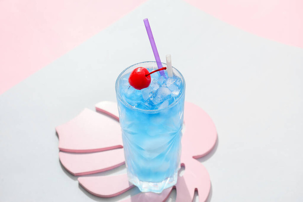 Glass of Blue Lagoon cocktail on light background - Photo, Image