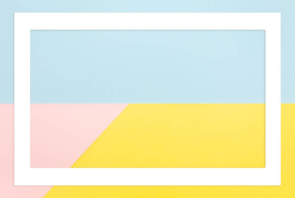 Abstract geometric shape pastel yellow, pink and blue color paper background - Foto, Bild