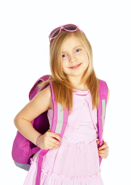 Smiling girl with backpack over white - Valokuva, kuva