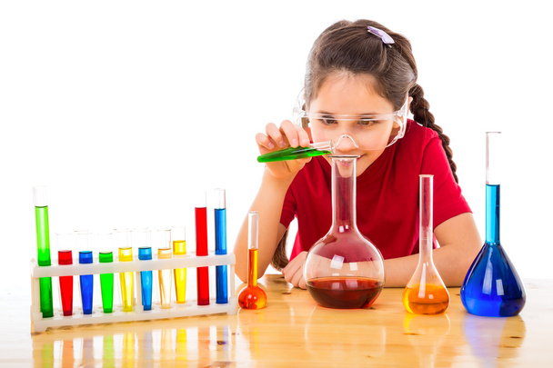 Girl making chemical experiments - Foto, immagini