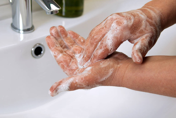 hands washing the water with soap - Fotoğraf, Görsel