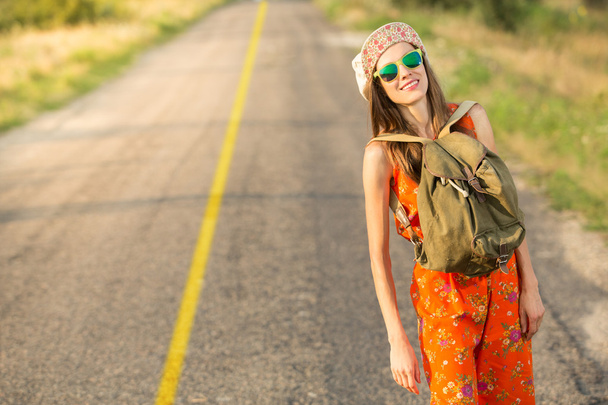 Beautiful young hipster woman traveling - Fotó, kép