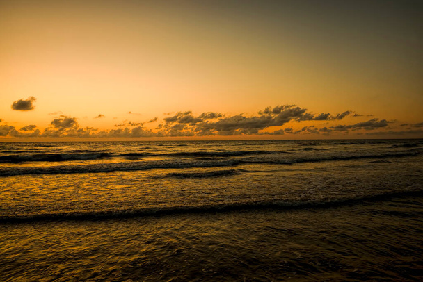 beautiful sunset over the sea - Фото, изображение