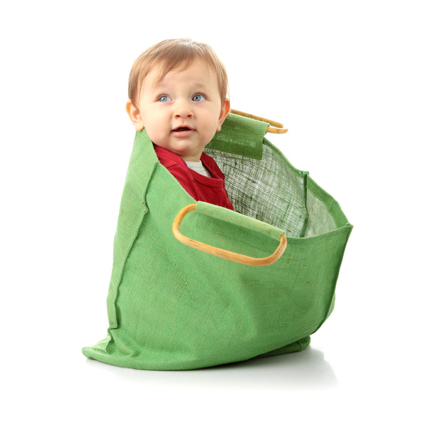 Baby girl in shopping bag - Foto, imagen