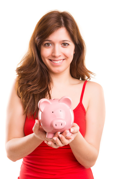 Woman holding piggy bank - Foto, Imagen