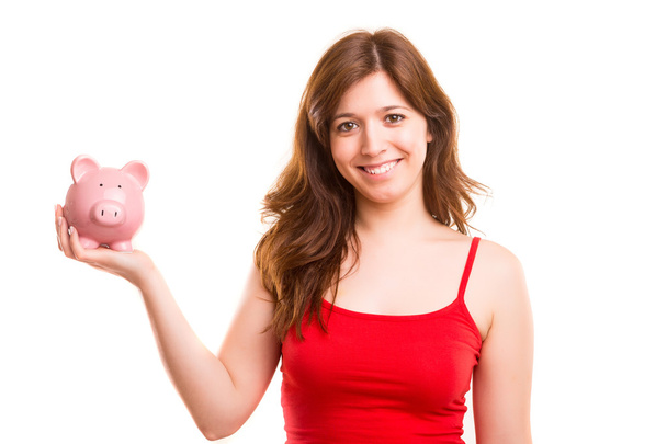 Woman holding piggy bank - Фото, изображение
