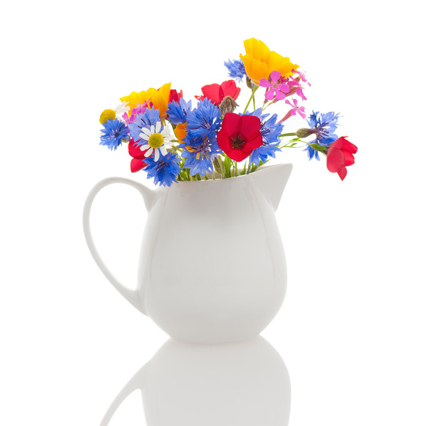 Wildflowers in jug - Фото, изображение