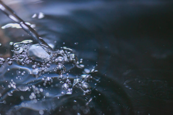 water drops on the surface of a river - Photo, Image
