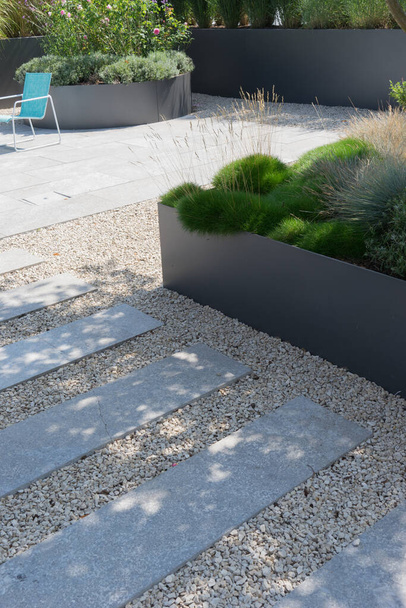 Modern garden architecture with herbs and grass - Foto, imagen