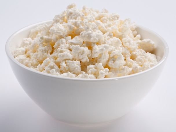 Bowl with fresh cottage cheese. - Photo, image