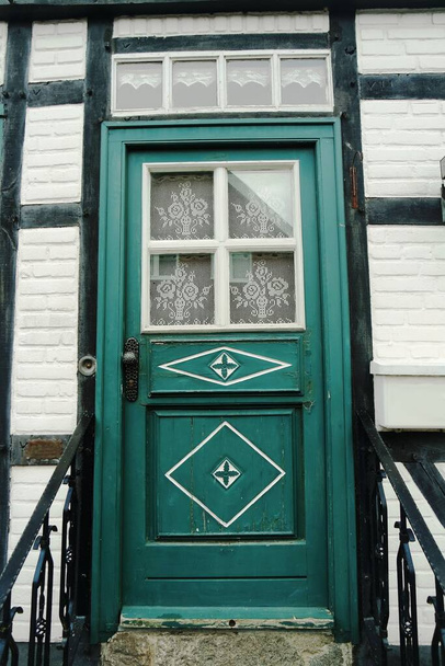 old wooden door with a window - Fotó, kép