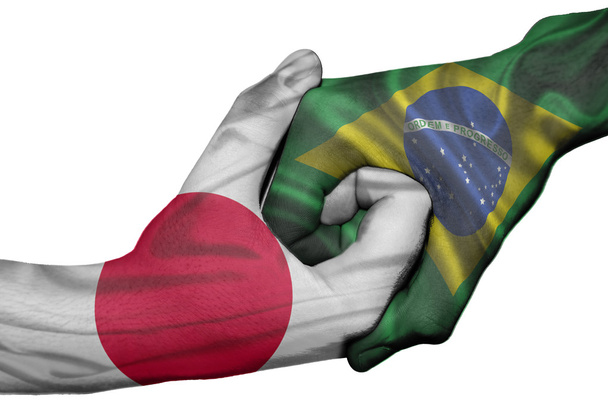 Aperto de mão entre Japão e Brasil
 - Foto, Imagem