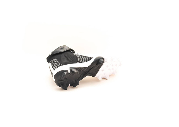 Un crampons de baseball, chaussure de baseball pour enfants isolés sur fond blanc. - Photo, image