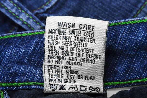 Wash care instructions on jeans - Photo, Image