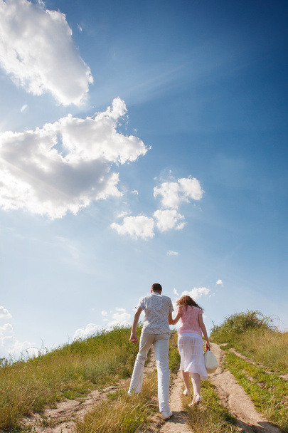 Couple on country walk holding hands - Photo, Image