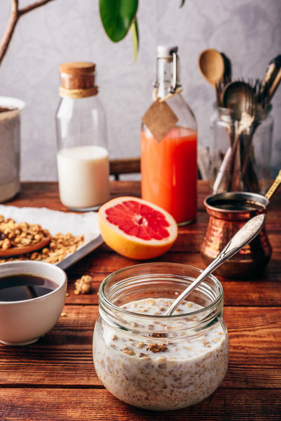Healthy breakfast with homemade granola, turkish coffee, fruits and freshly squeezed juice - Фото, зображення