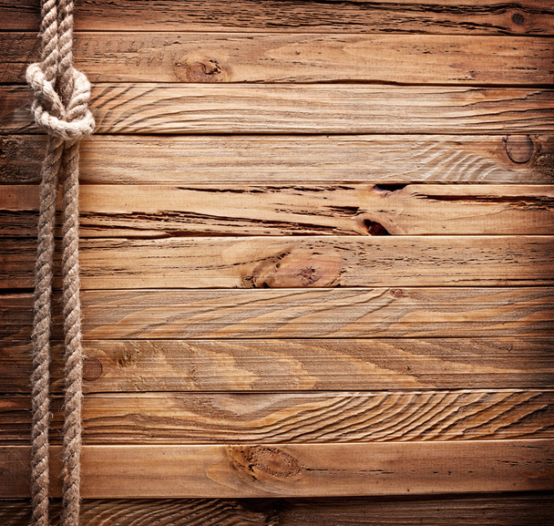 Image of old texture of wooden boards with ship rope. - 写真・画像