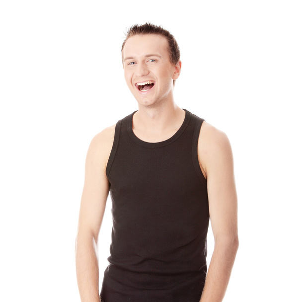 Young man laughing - Фото, изображение
