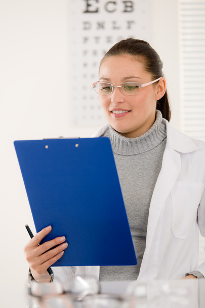Optician doctor woman with glasses and eye chart - Foto, Imagem