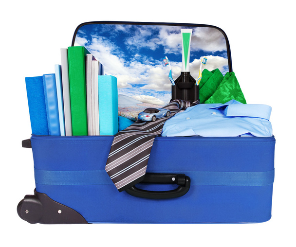 Travel blue business suitcase packed for trip - Foto, Bild