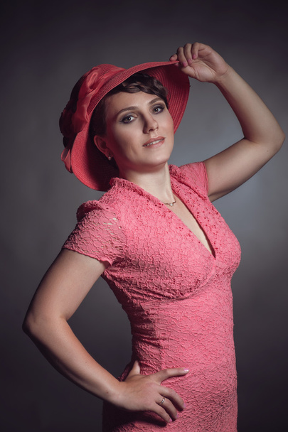 Brunette woman in pink dress - Foto, Imagem