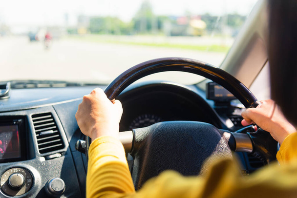 woman driving car with steering wheel - Foto, Imagem