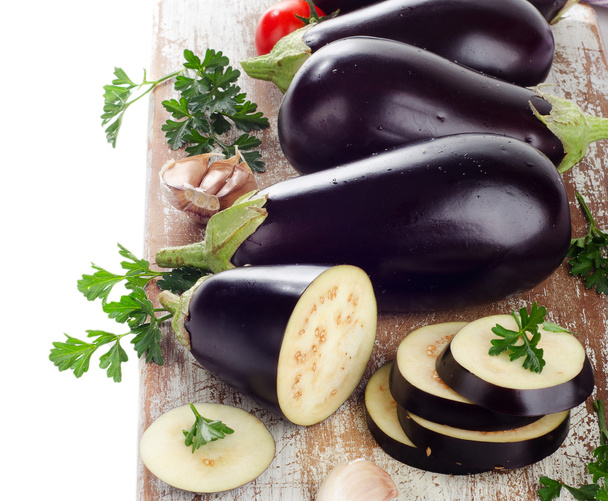 Eggplants on a wooden border - Foto, Imagem