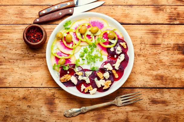 Vegetable salad made from beets,peppers,olives and cheese.Copy space - Foto, Imagen