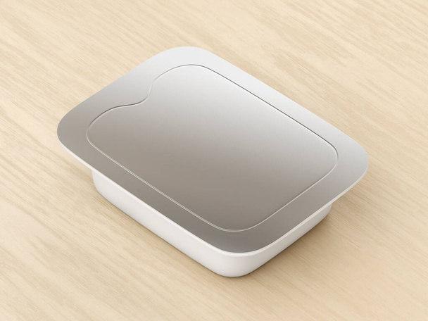 Plastic food container with silver lid on the wooden table - Foto, immagini