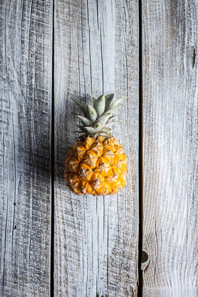 fresh pineapple on wooden background - Foto, imagen
