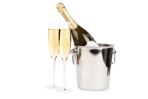 champagne bottle with a glass of sparkling wine isolated on white background - Valokuva, kuva