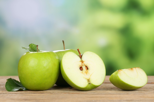 Green apple in summer with copyspace - Фото, изображение