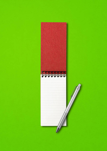 Blank open spiral notebook and pen mockup isolated on green - Zdjęcie, obraz