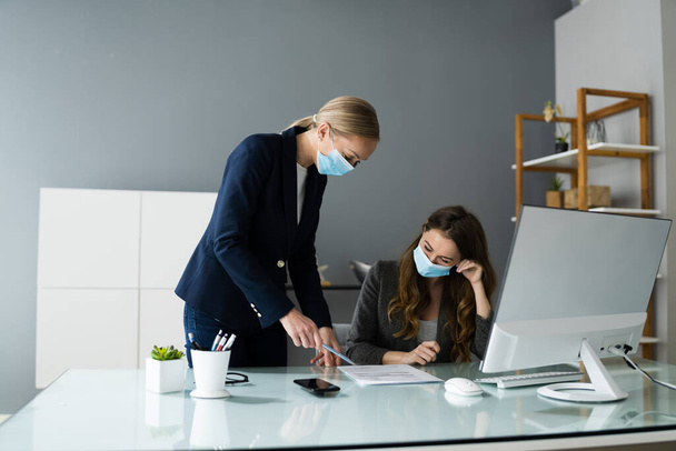 Business Employees Social Distancing With Face Mask In Office - Foto, afbeelding