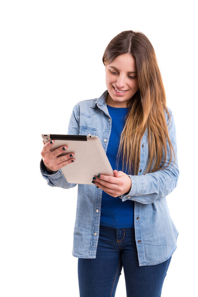 young woman with tablet pc and digital device - Foto, imagen