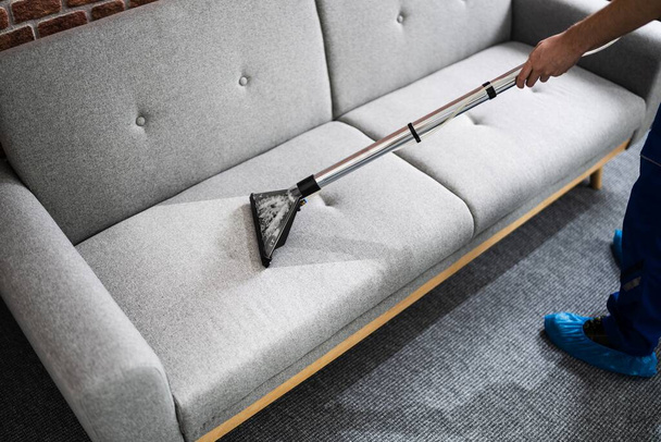 Professional Sofa Cleaning Service Using Vacuum Cleaner - Φωτογραφία, εικόνα