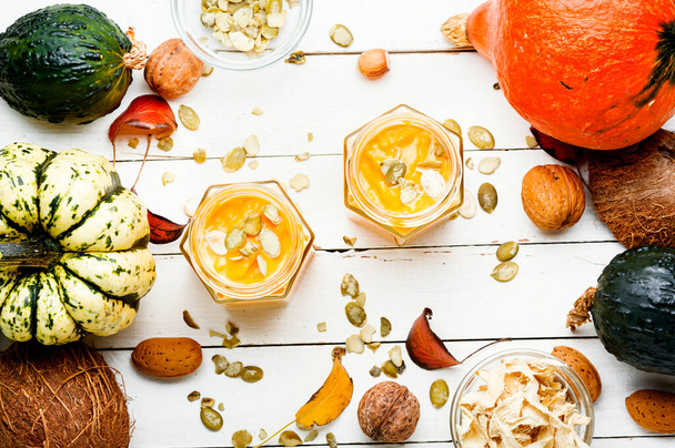 Healthy pumpkin smoothie in glass jars.Fresh pumpkin juice - Fotó, kép