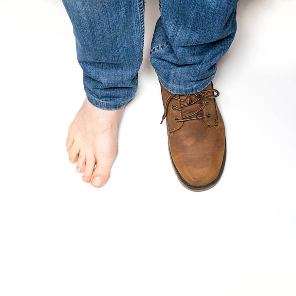 feet of a woman's legs on a white background - Photo, image