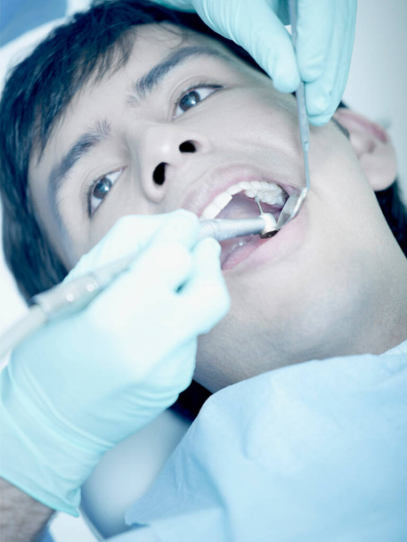 dentist with a patient in the dental clinic - Photo, image