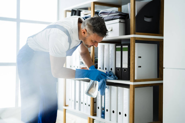 Professional Janitor Office Cleaning Service. Man With Chemical Spray - Fotoğraf, Görsel