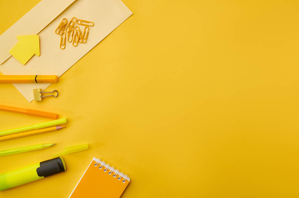 school supplies on yellow background. top view. copy space. - Photo, image