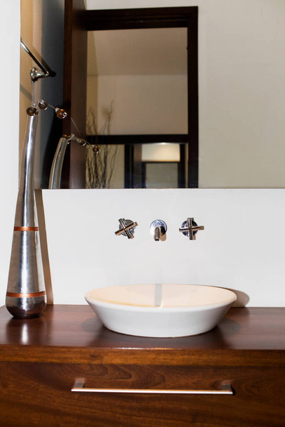 modern bathroom interior with white sink and faucet - 写真・画像