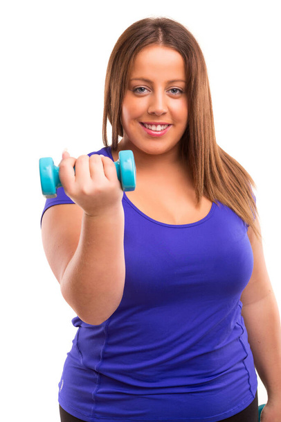 young woman with dumbbells isolated on white background - Fotoğraf, Görsel