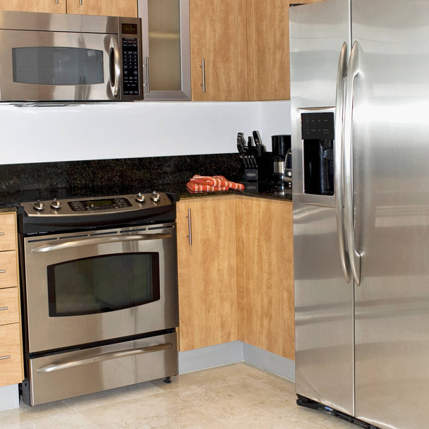 modern kitchen interior with fireplace and appliances - Foto, Bild