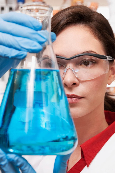young woman scientist working in laboratory - Photo, Image
