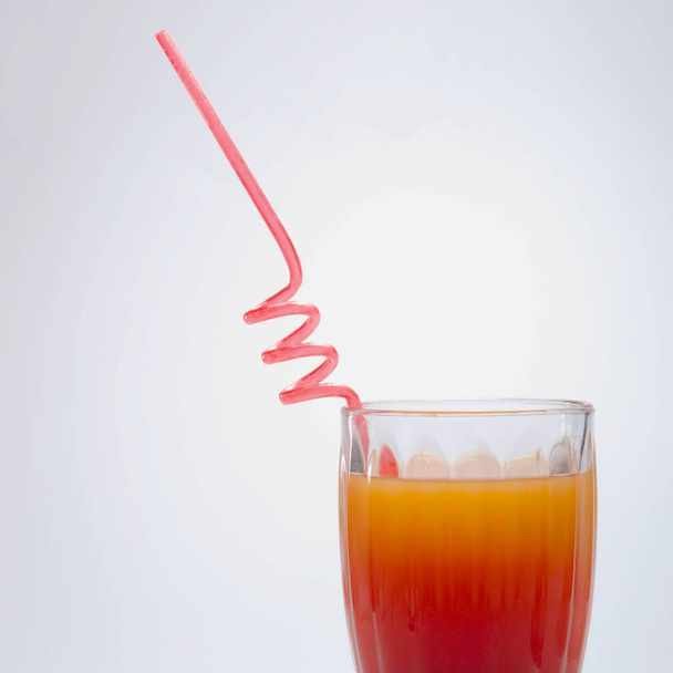glass of fresh juice on white background - 写真・画像