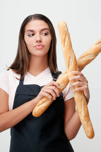 woman with bread on white background - Fotó, kép