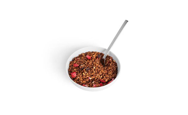 Granola isolated on a white background. Granola with chocolate and strawberries. - Фото, зображення