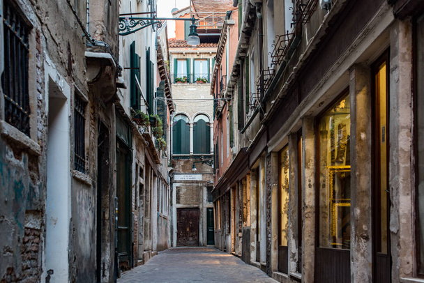 Venice - August 2021: Empty streets of tourists in Venice. Calle del Fabro. - Valokuva, kuva