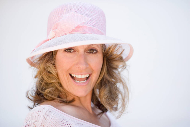 portrait of a beautiful woman with hat on a white background - Fotoğraf, Görsel
